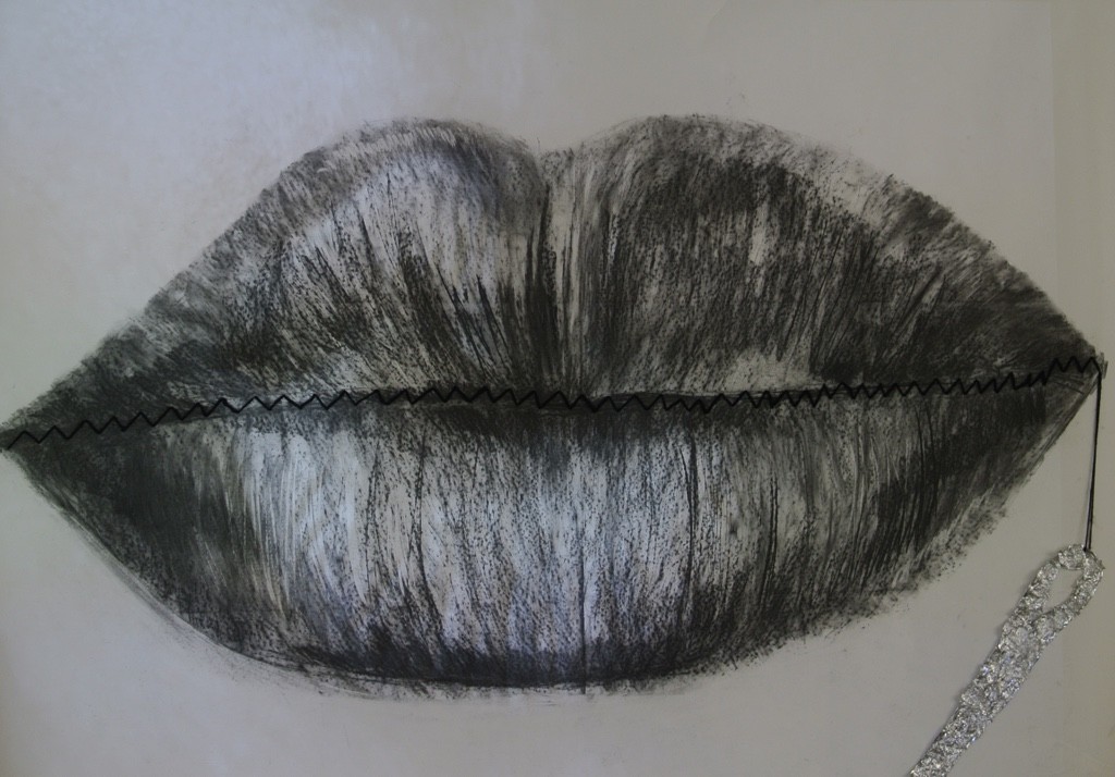 A drawing of a pair of lips, sewn together